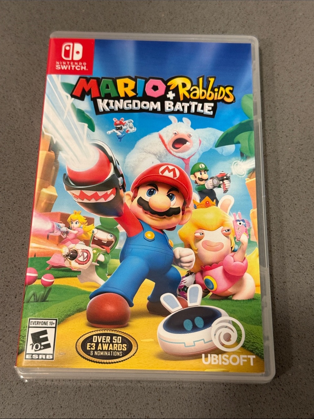 Nintendo Switch Mario + Rabbids Kingdom Battle (Red/Blue) - Ubisoft
